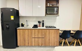 Apartamento Exclusivo Frente al Mall con WiFi, Parqueadero y Vista Panorámica